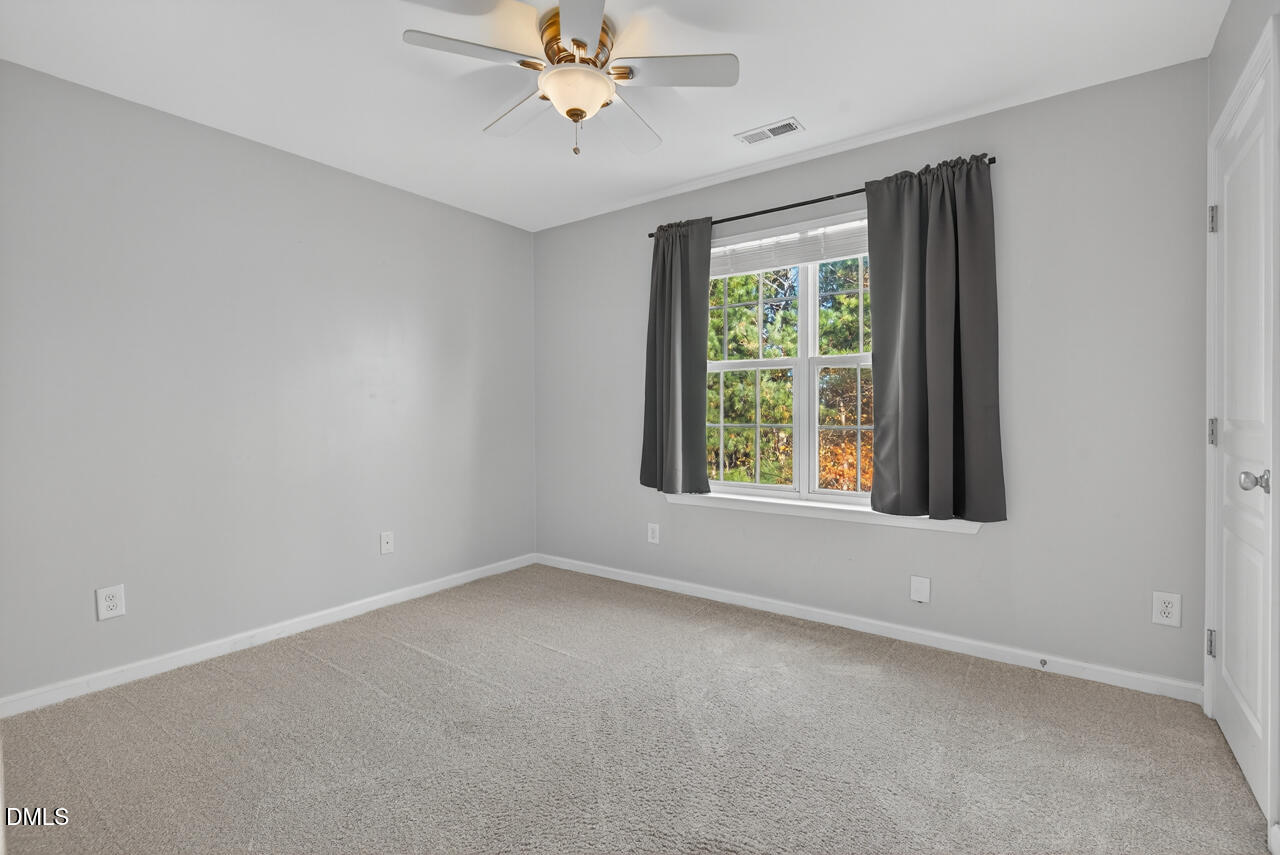 3811 Ramblewood Avenue Durham, NC 27713 - Photo 24 of 27 a view of an empty room with a window
