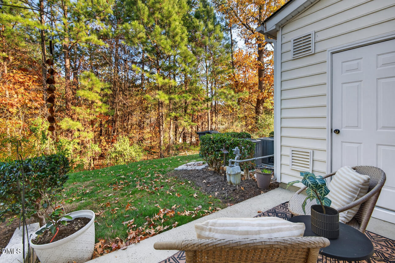 3811 Ramblewood Avenue Durham, NC 27713 - Photo 27 of 27 a view of backyard with outdoor seating and plants