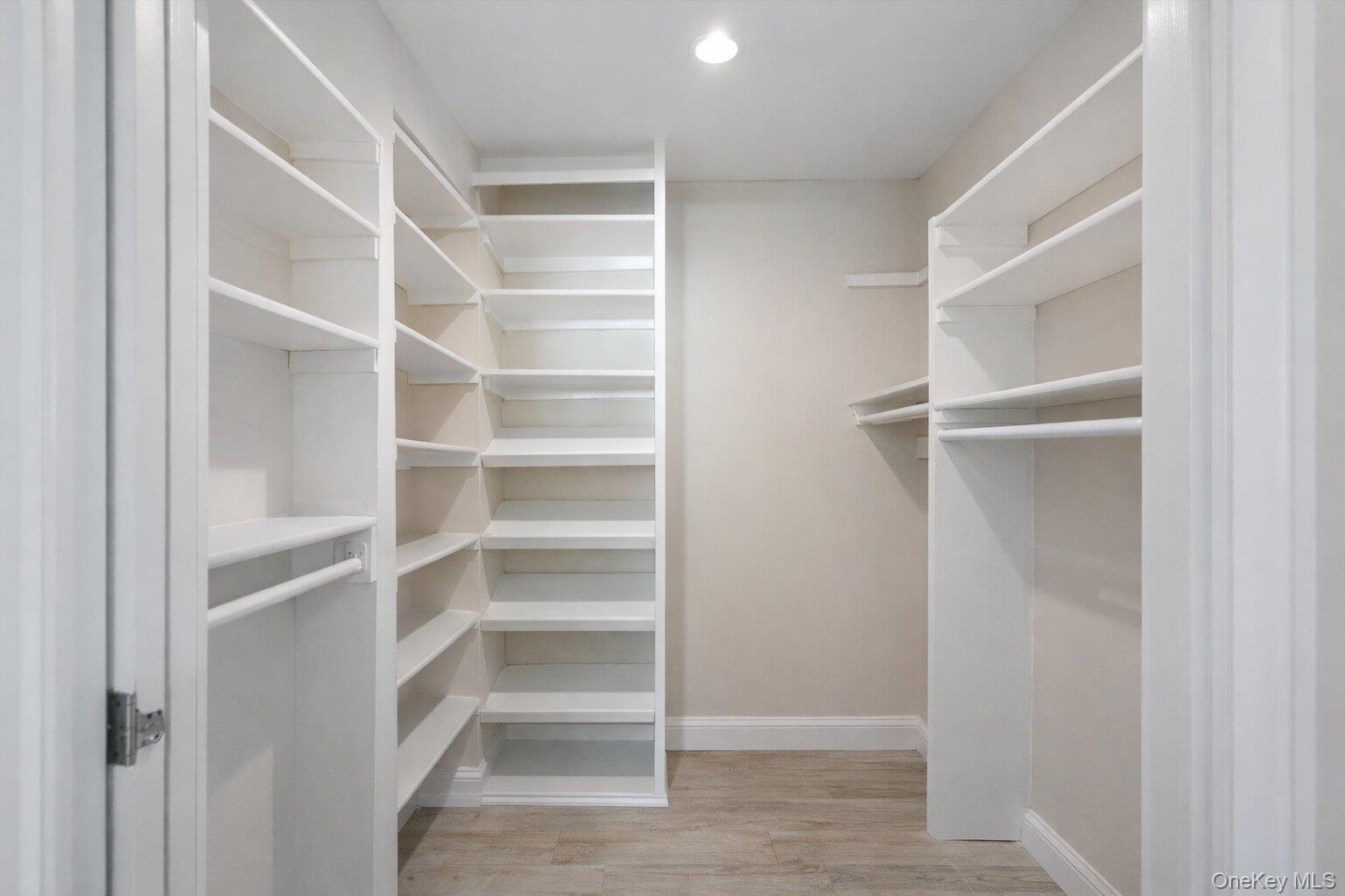 2 Richmond Road, Unit 2A Lido Beach, NY 11561 - Photo 8 of 12 a view of walk in closet with empty racks