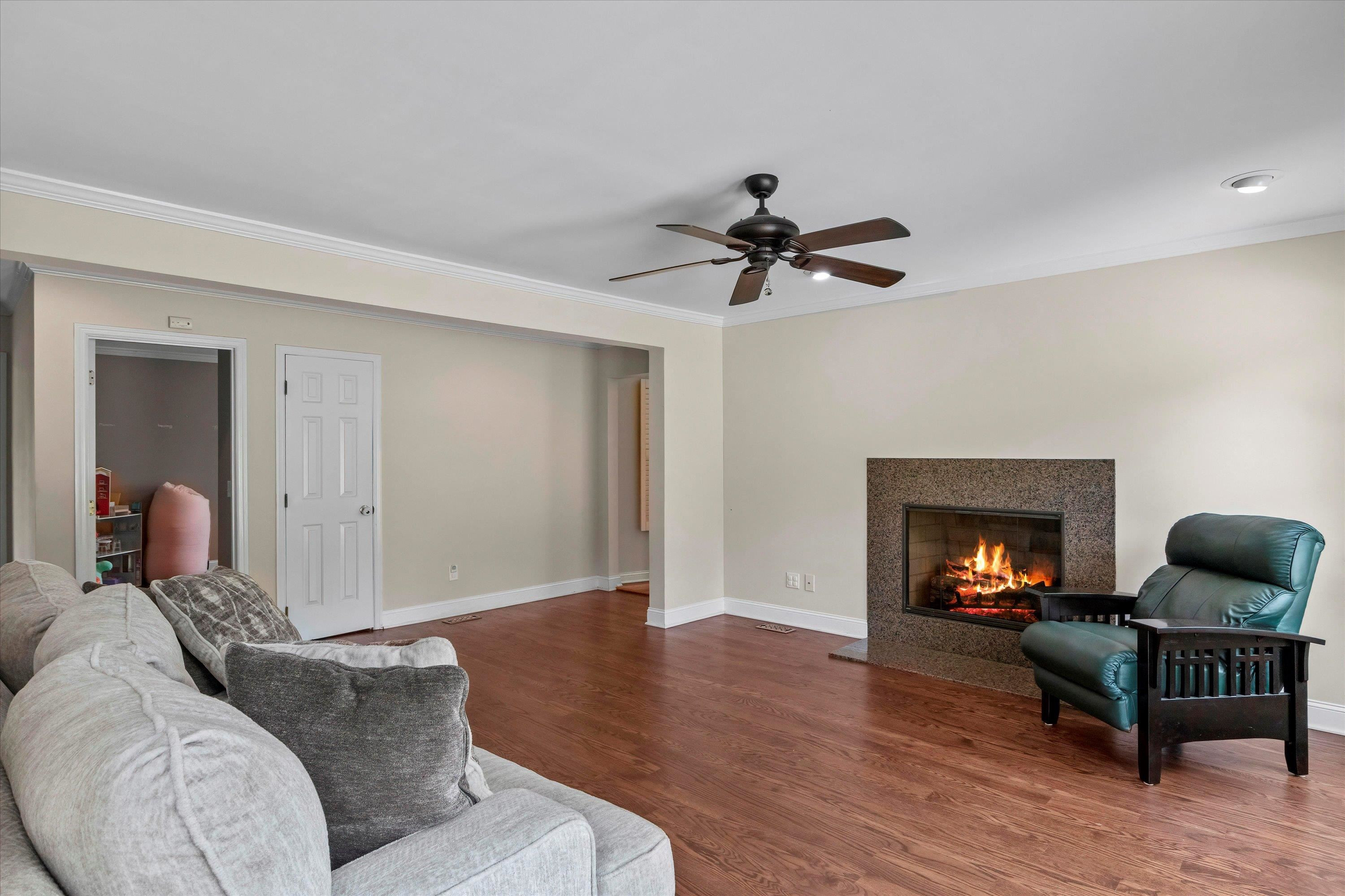 3509 Old Milburnie Road Raleigh, NC 27616 - Photo 20 of 74 a living room with furniture and a fireplace