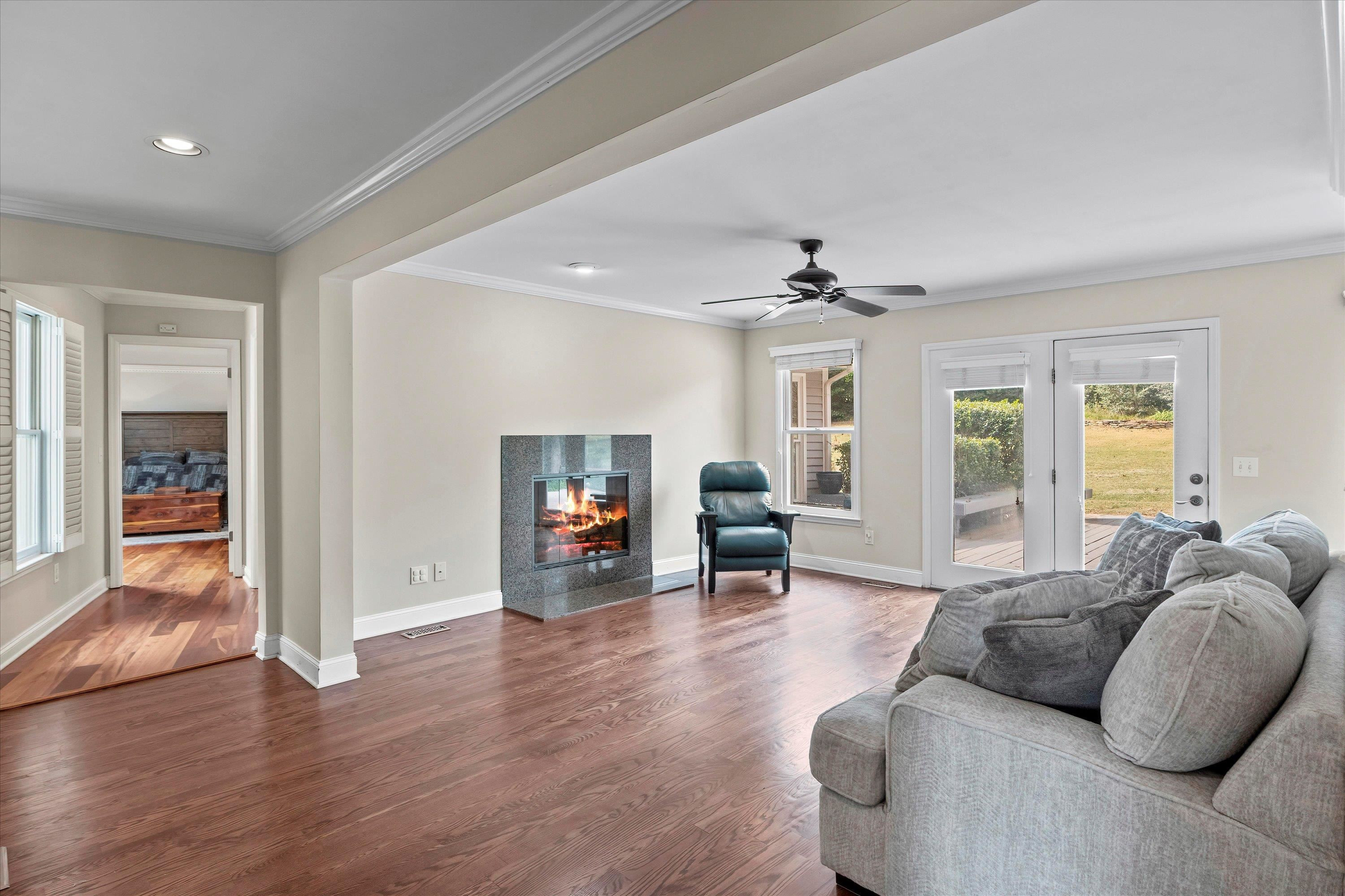 3509 Old Milburnie Road Raleigh, NC 27616 - Photo 21 of 74 a living room with furniture and a flat screen tv