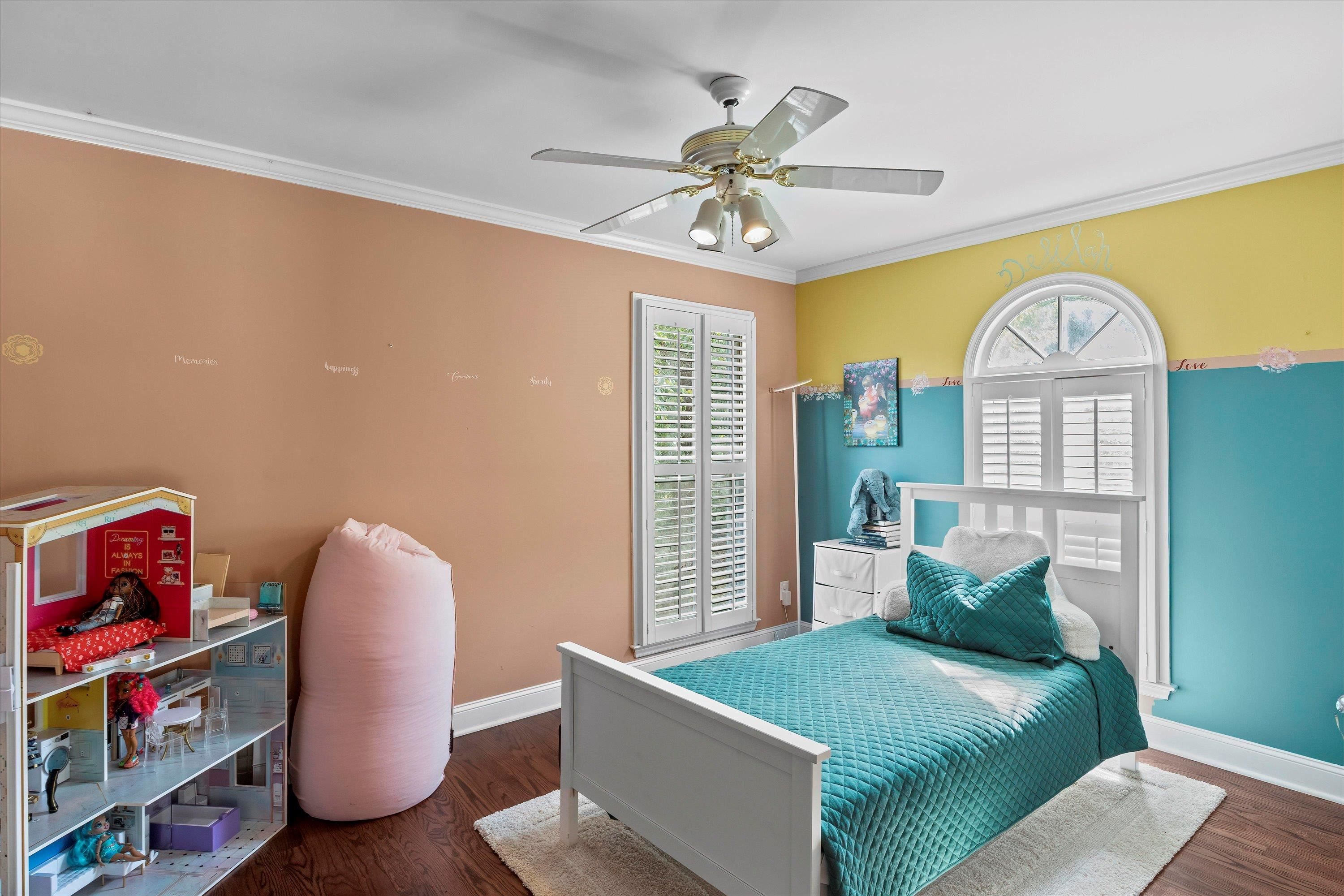 3509 Old Milburnie Road Raleigh, NC 27616 - Photo 22 of 74 a bedroom with a bed and a chandelier