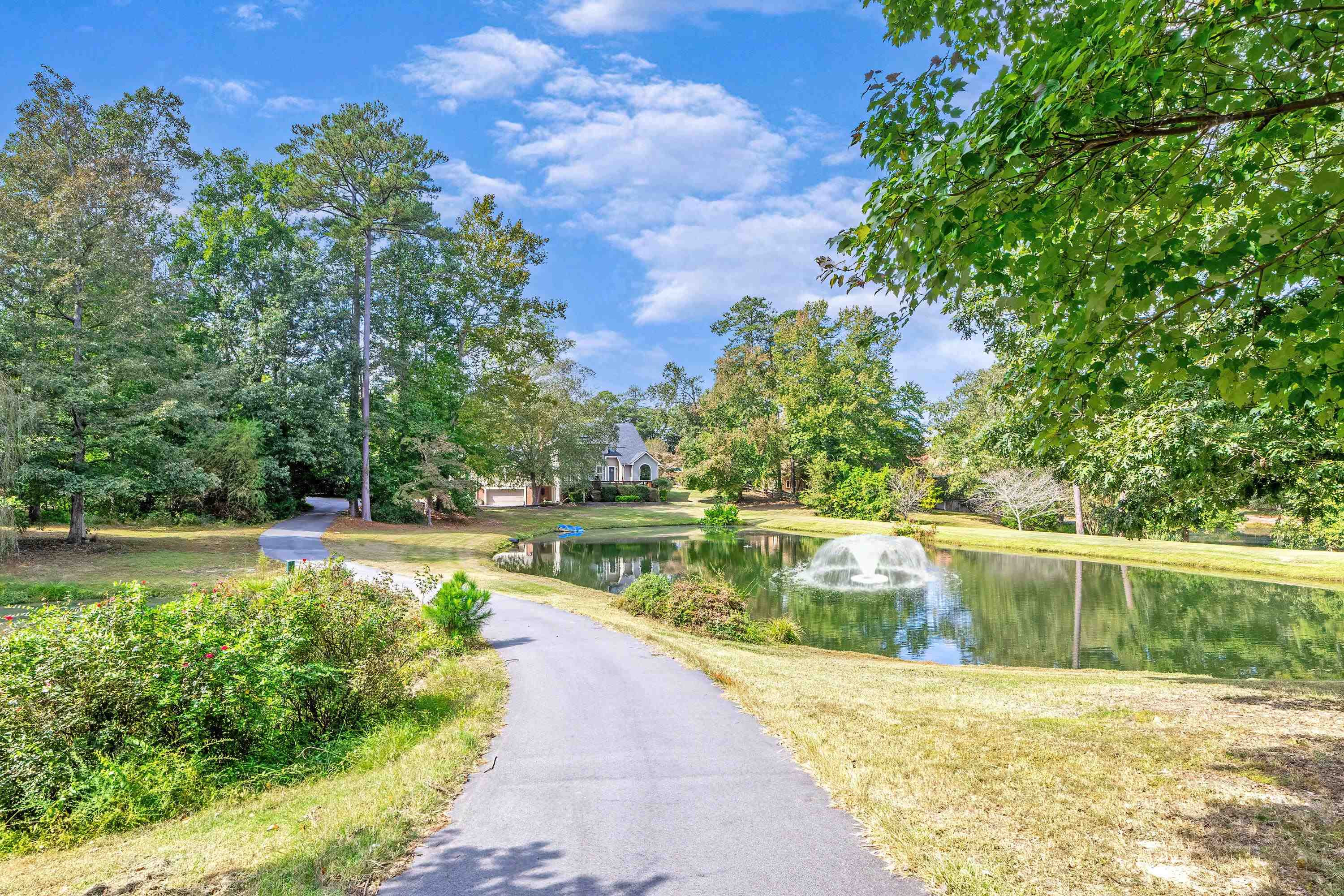 3509 Old Milburnie Road Raleigh, NC 27616 - Photo 3 of 74 a view of a swimming pool with a lake view