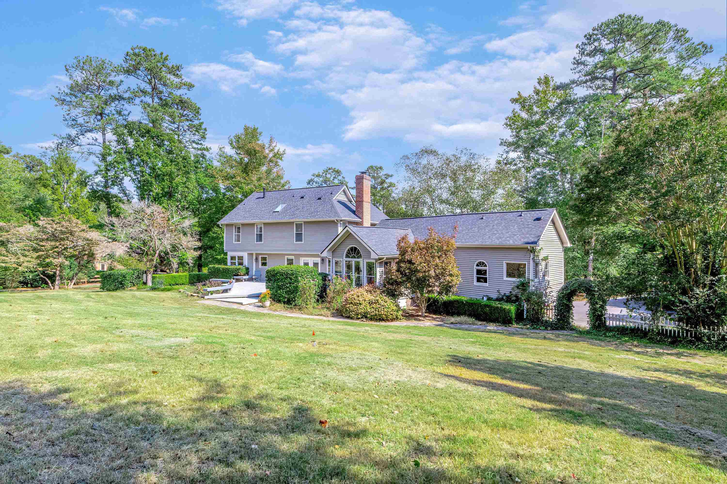3509 Old Milburnie Road Raleigh, NC 27616 - Photo 4 of 74 a front view of house with yard and trees