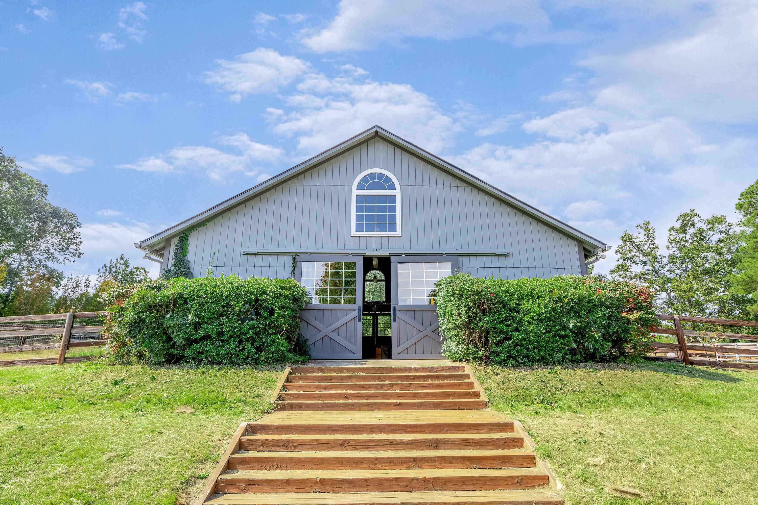 3509 Old Milburnie Road Raleigh, NC 27616 - Photo 53 of 74 a front view of a house with garden