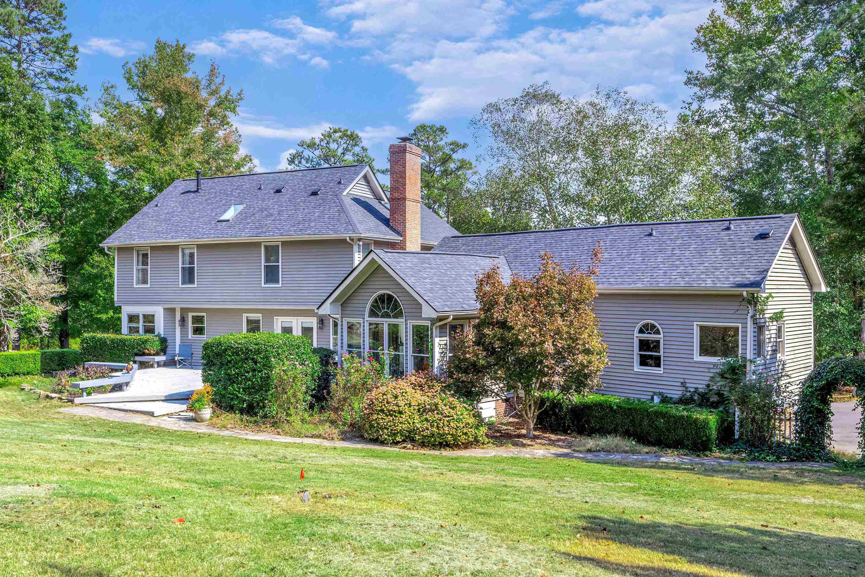 3509 Old Milburnie Road Raleigh, NC 27616 - Photo 55 of 74 a front view of a house with a yard