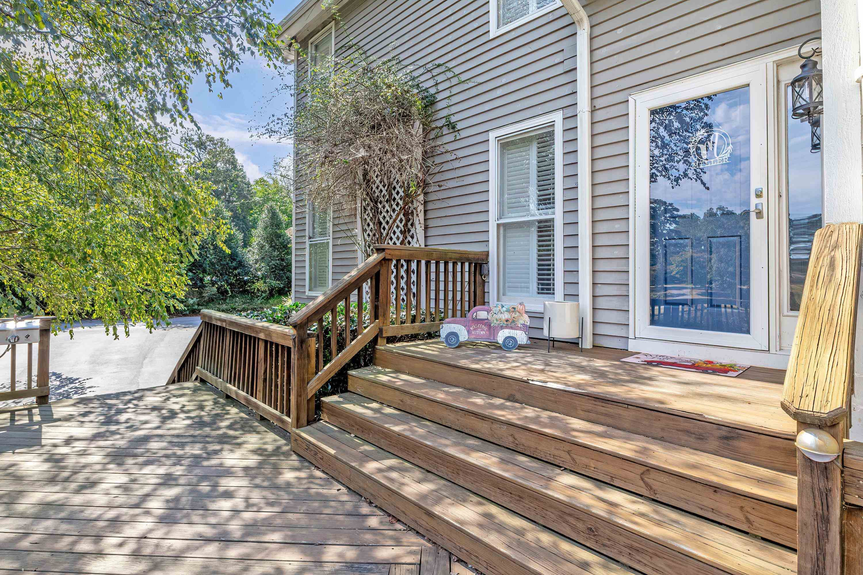 3509 Old Milburnie Road Raleigh, NC 27616 - Photo 57 of 74 a view of backyard with deck and wooden floor