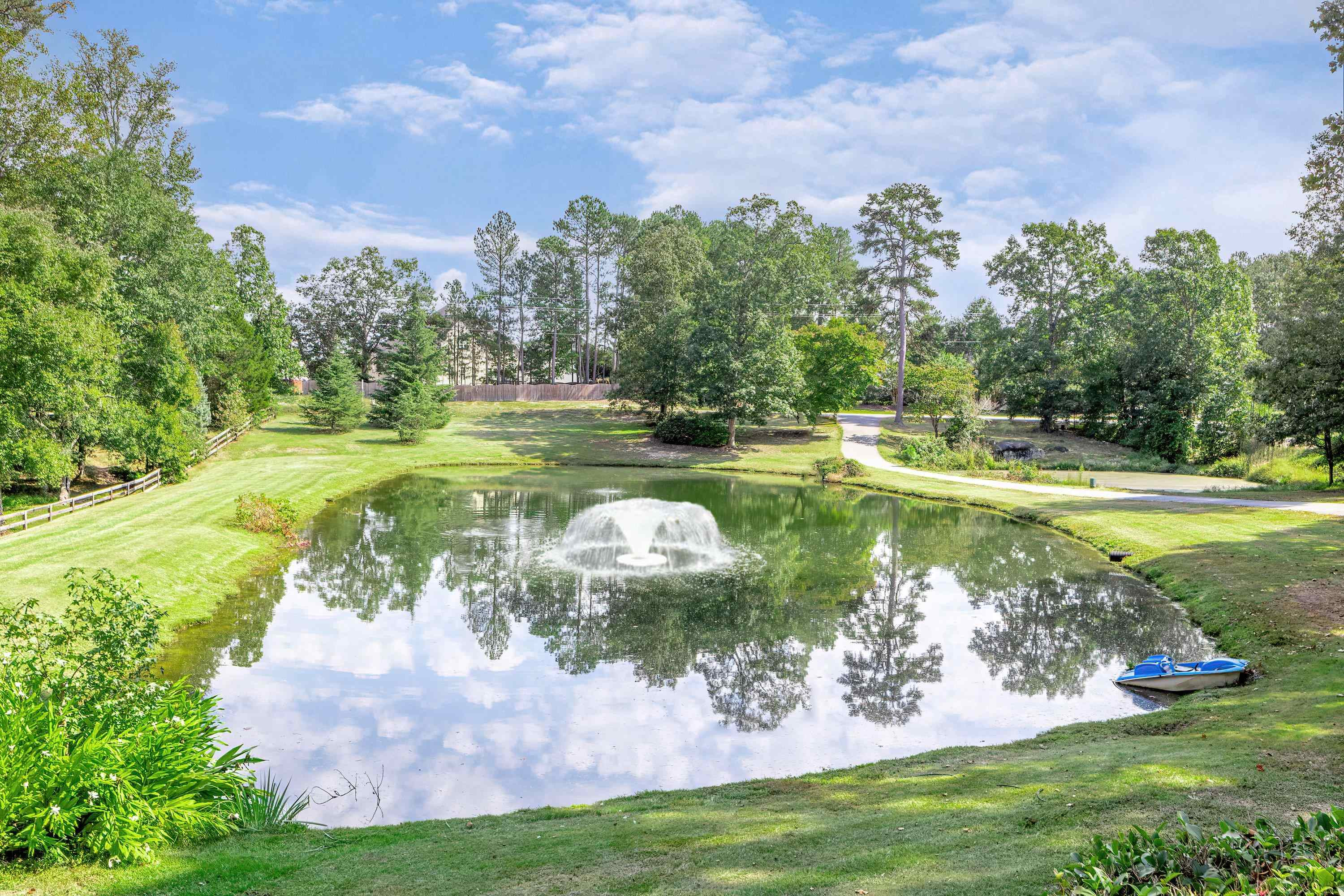 3509 Old Milburnie Road Raleigh, NC 27616 - Photo 59 of 74 a view of a golf course with a lake
