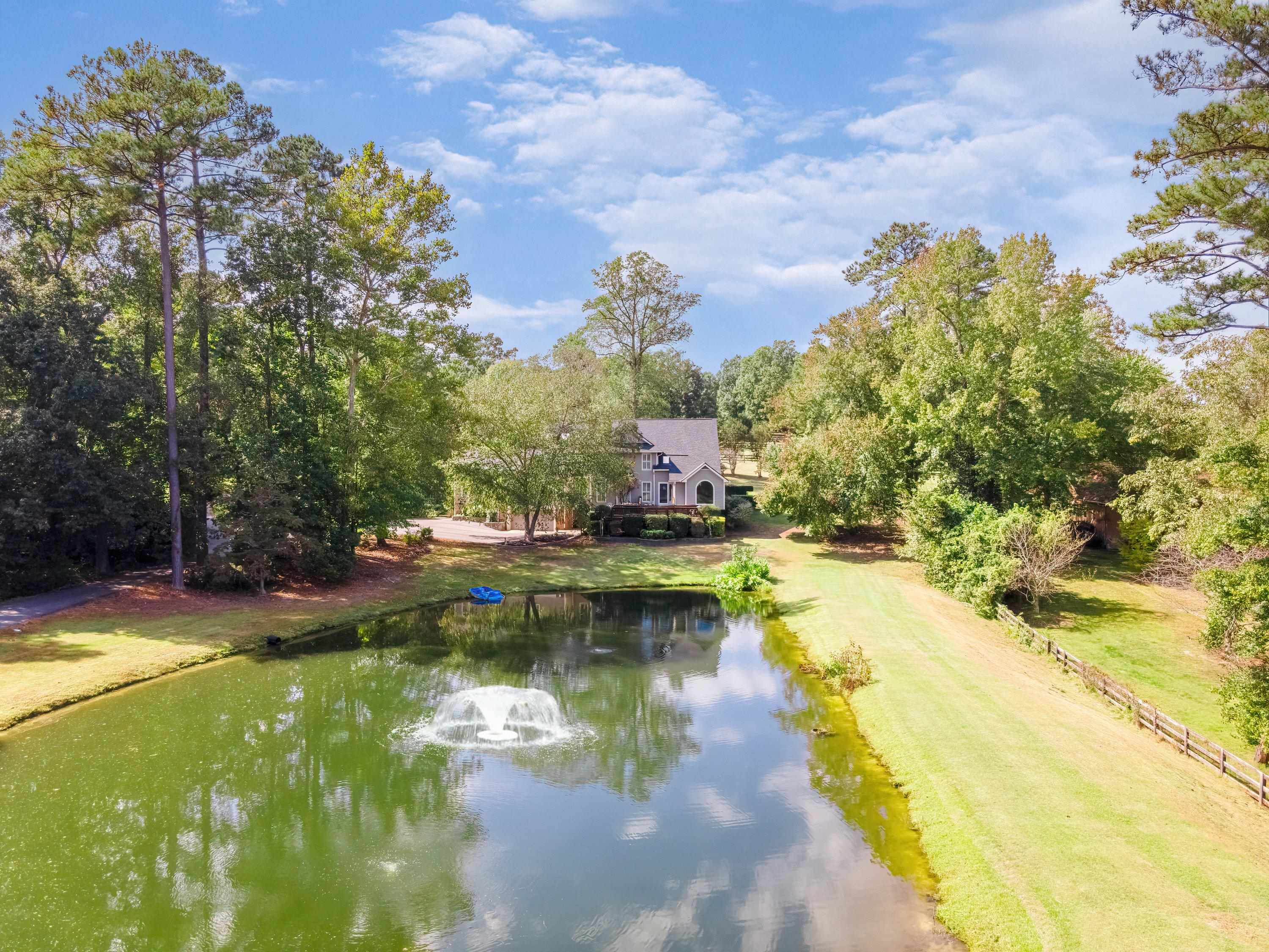 3509 Old Milburnie Road Raleigh, NC 27616 - Photo 64 of 74 a view of a swimming pool with a yard