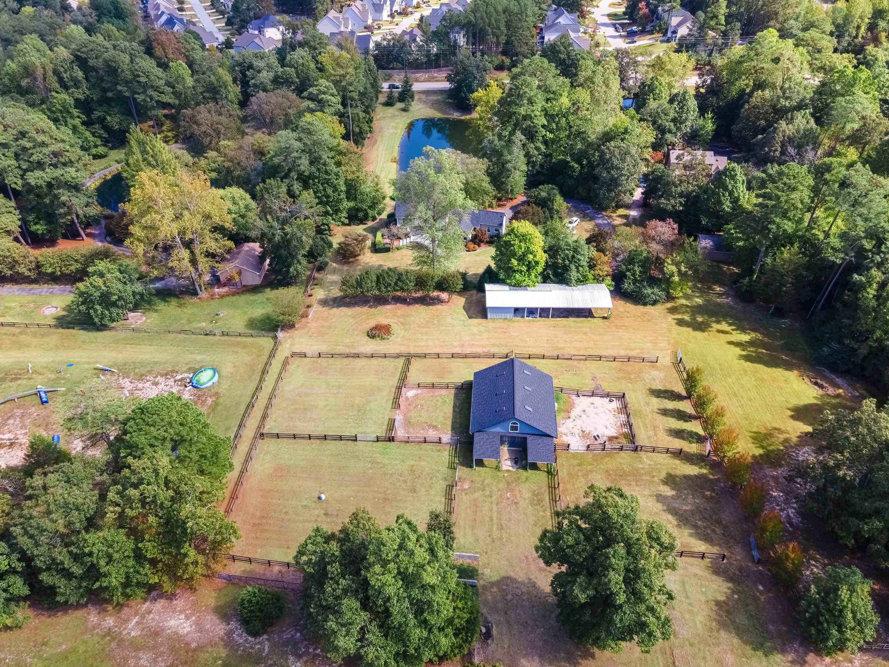 3509 Old Milburnie Road Raleigh, NC 27616 - Photo 66 of 74 an aerial view of a house with a yard basket ball court and outdoor seating