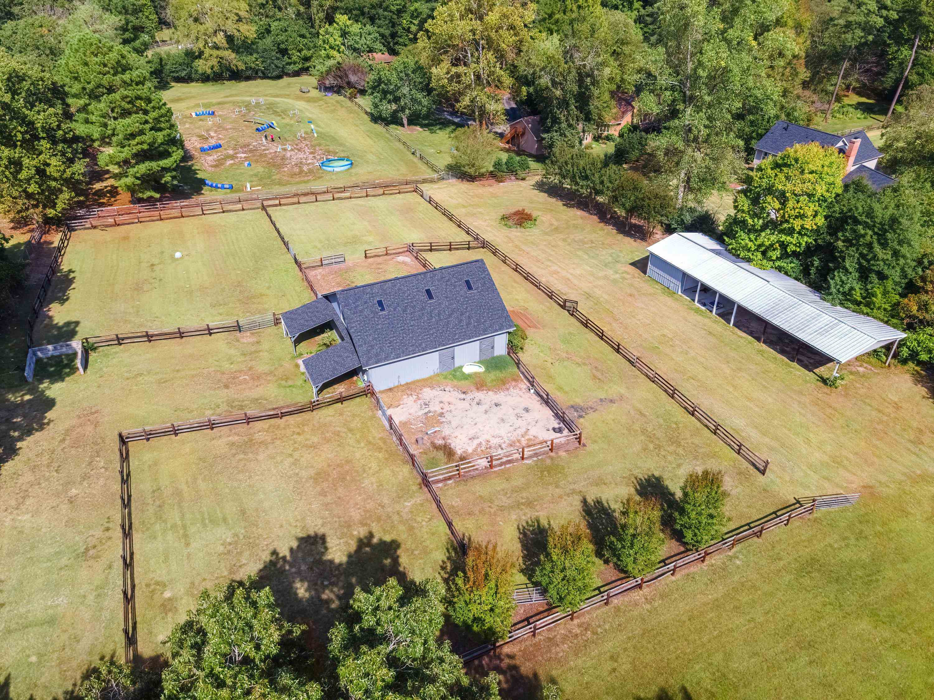 3509 Old Milburnie Road Raleigh, NC 27616 - Photo 71 of 74 an aerial view of a house with a yard and large trees