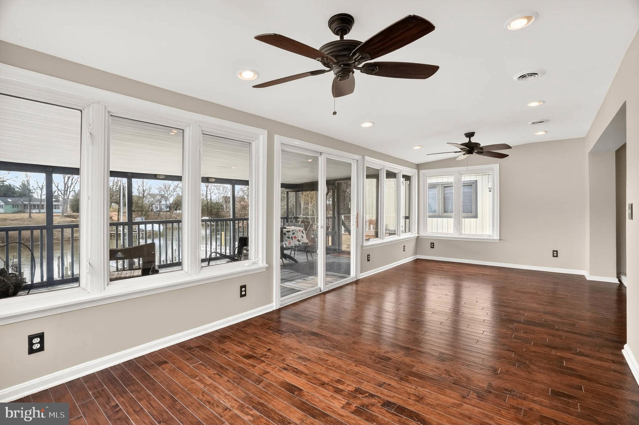 333 Sturtons Lane Pasadena, MD 21122 - Photo 12 of 46 Window-lined Living Room