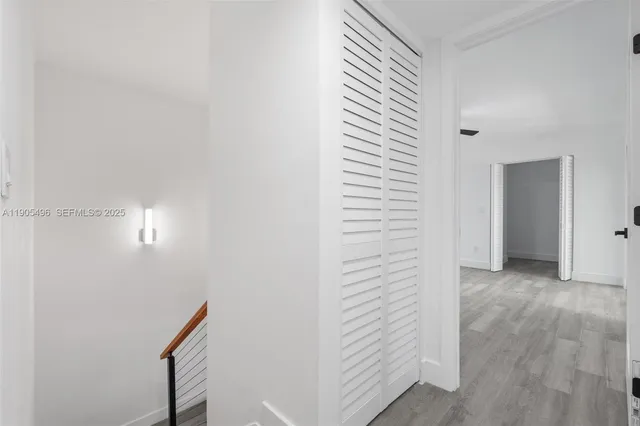 a view of a hallway with closet