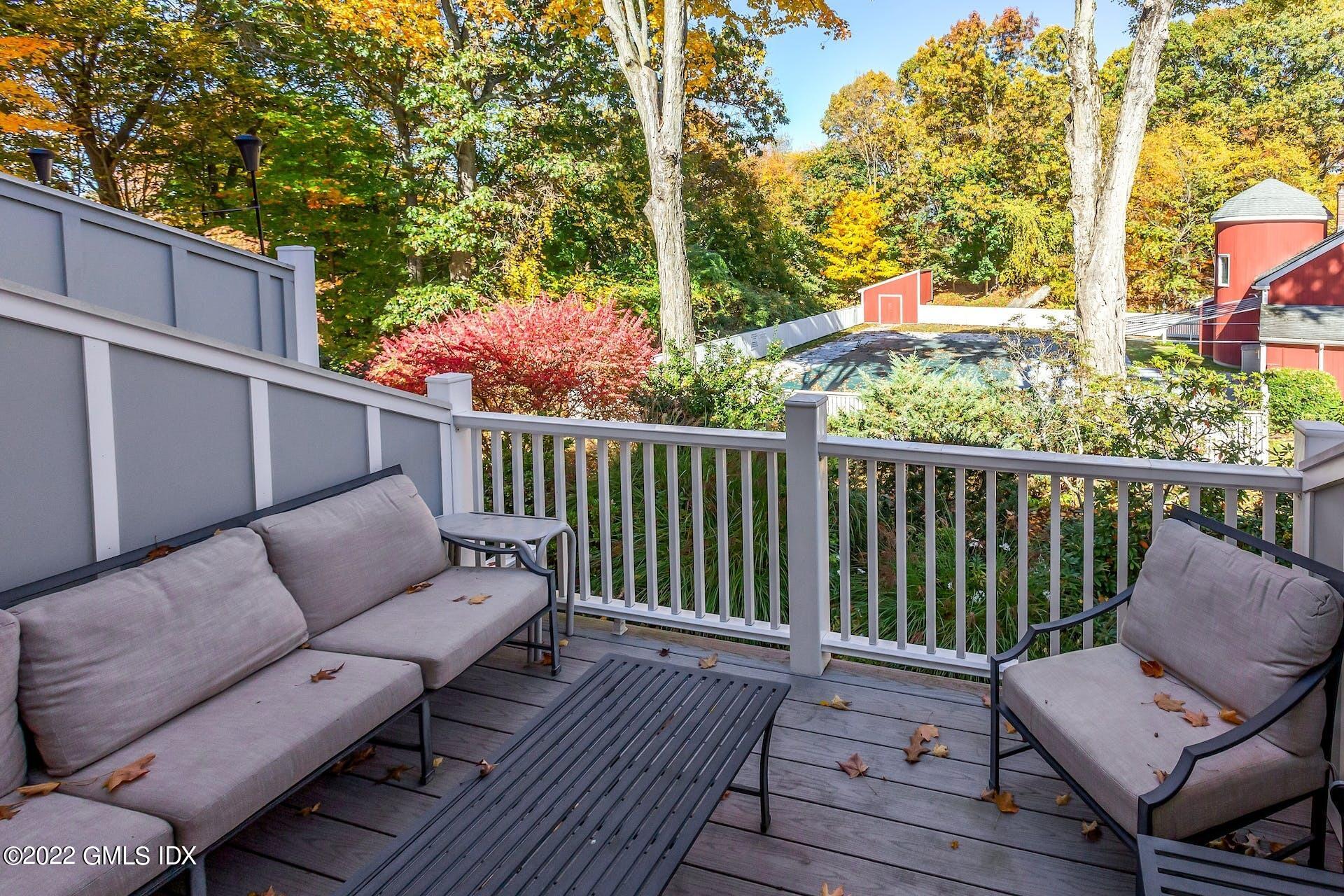 100 Silo Circle, Unit 100 Riverside, CT 06878 - Photo 14 of 22 a balcony view with a couch