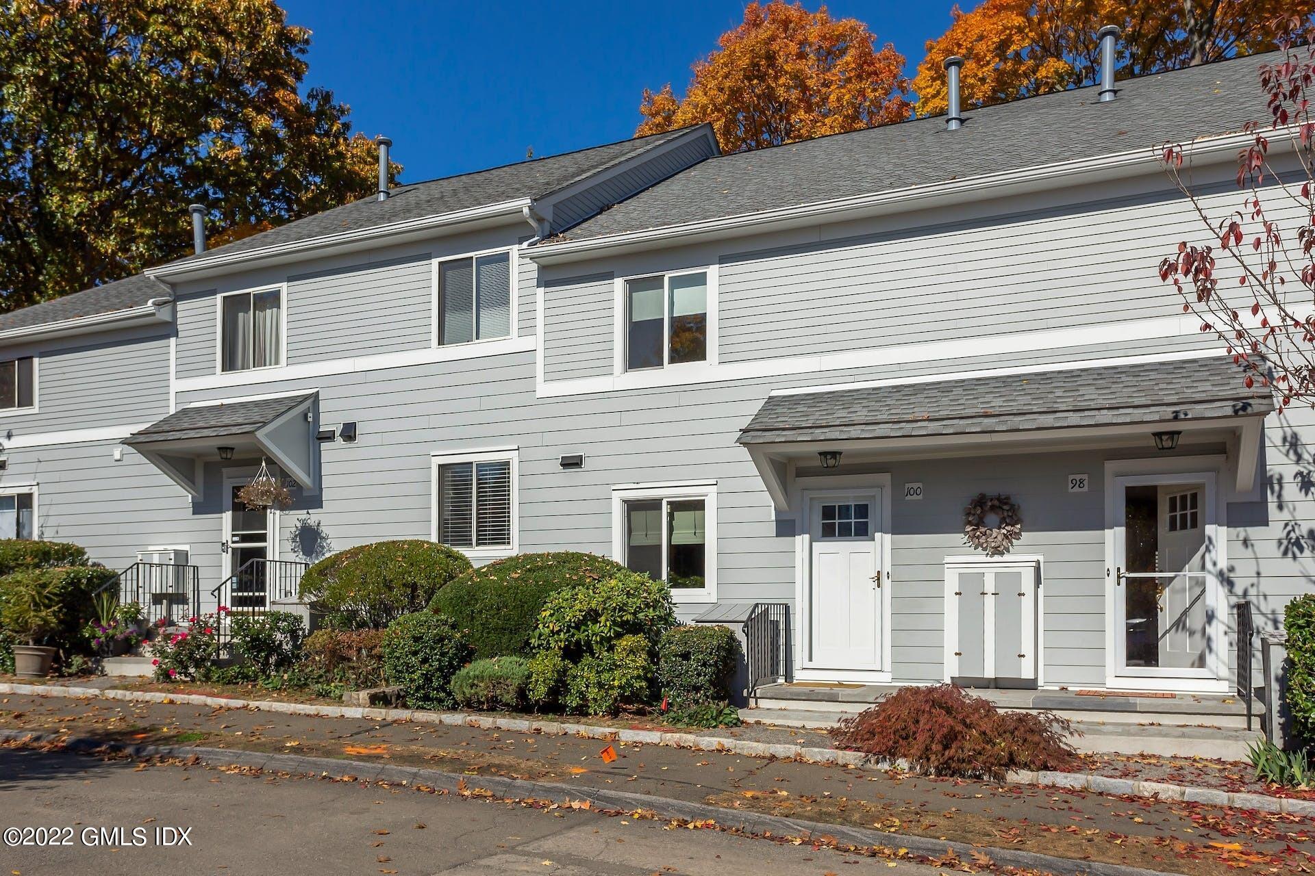 100 Silo Circle, Unit 100 Riverside, CT 06878 - Photo 15 of 22 front view of a house with a small yard
