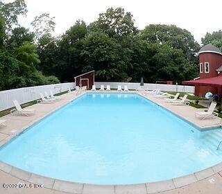 100 Silo Circle, Unit 100 Riverside, CT 06878 - Photo 17 of 22 a terrace with a table and chairs