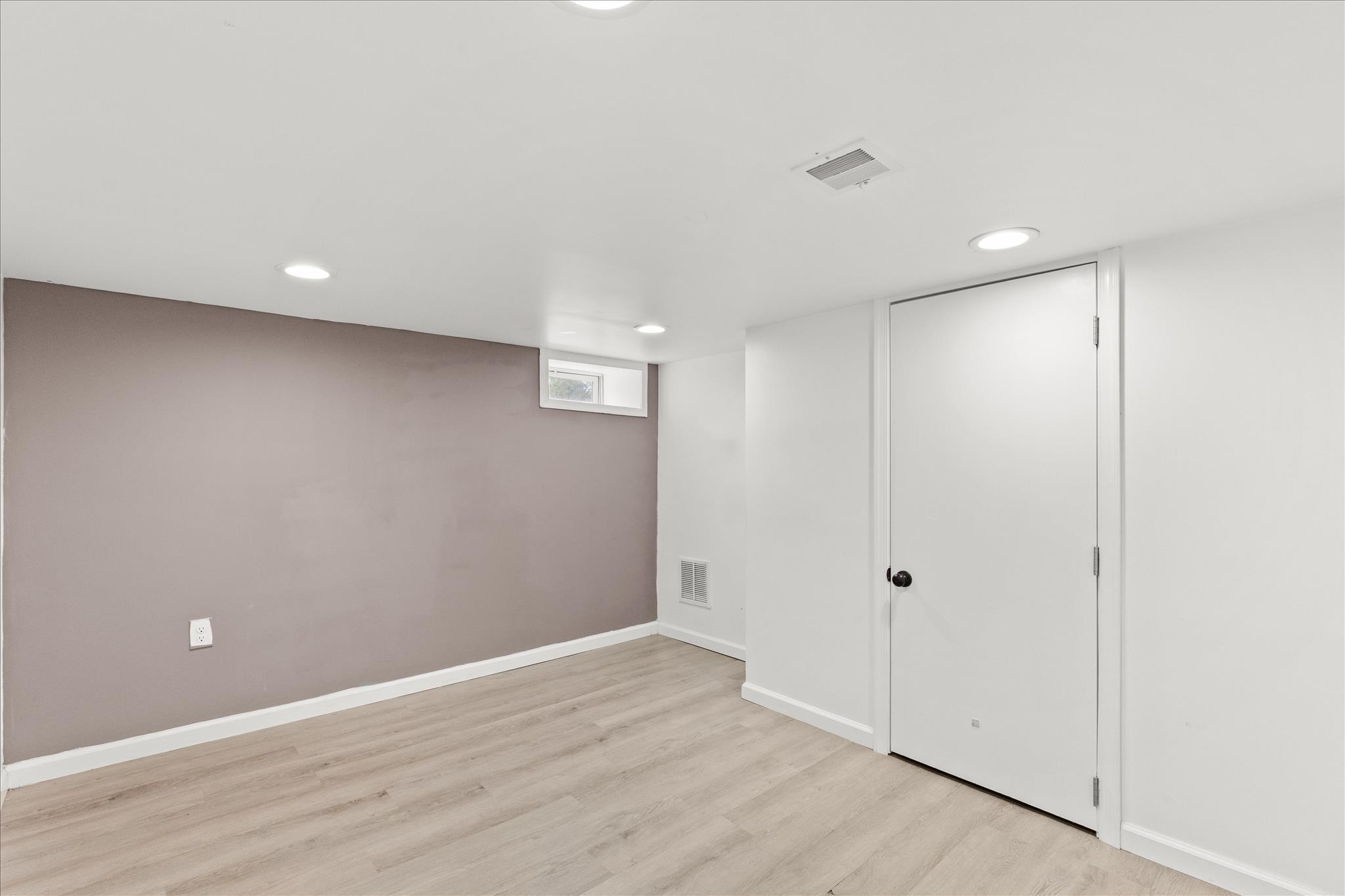 310 Hanover Road York, PA 17408 - Photo 33 of 56 a view of an empty room with wooden floor