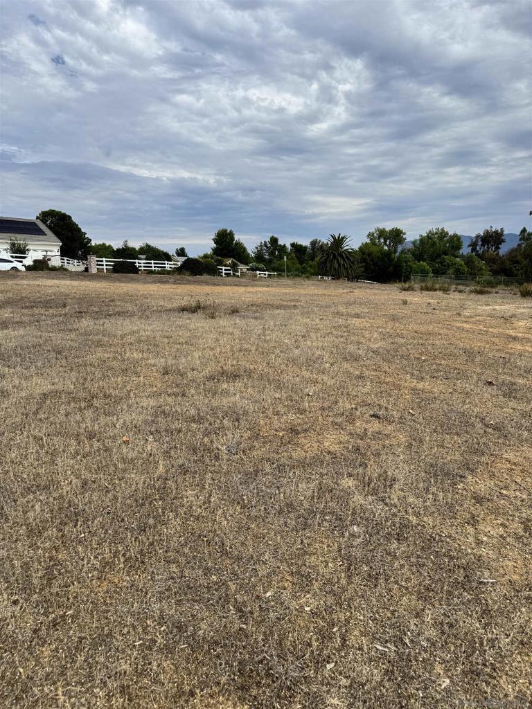0 Green Tree Road Temecula, CA 92592 - Photo 4 of 5 a view of a lake with houses in the back