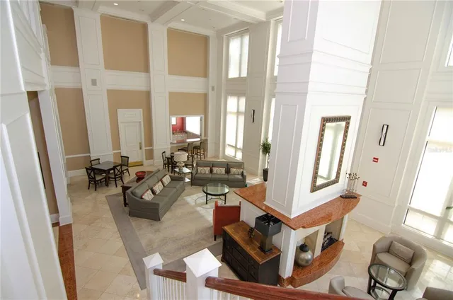 a living room with furniture and a rug