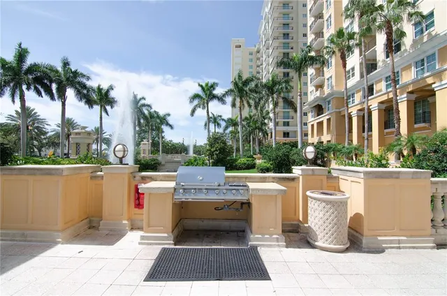 a view of a dinning table and chairs in the patio