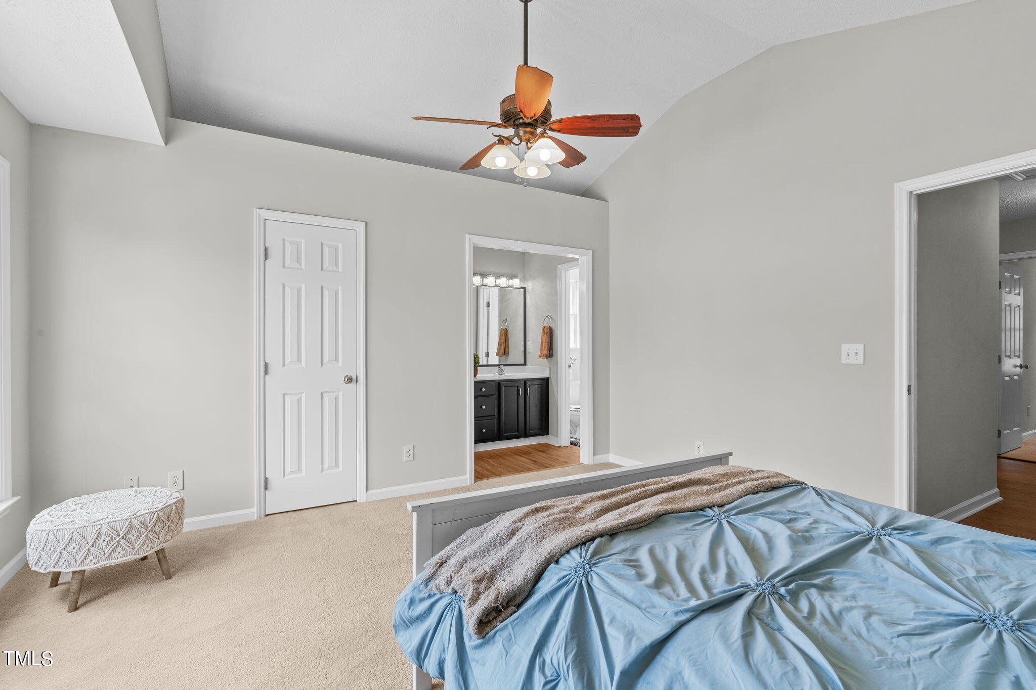 Undisclosed Address Garner, NC 27529 - Photo 16 of 31 a bedroom with a bed and a chandelier