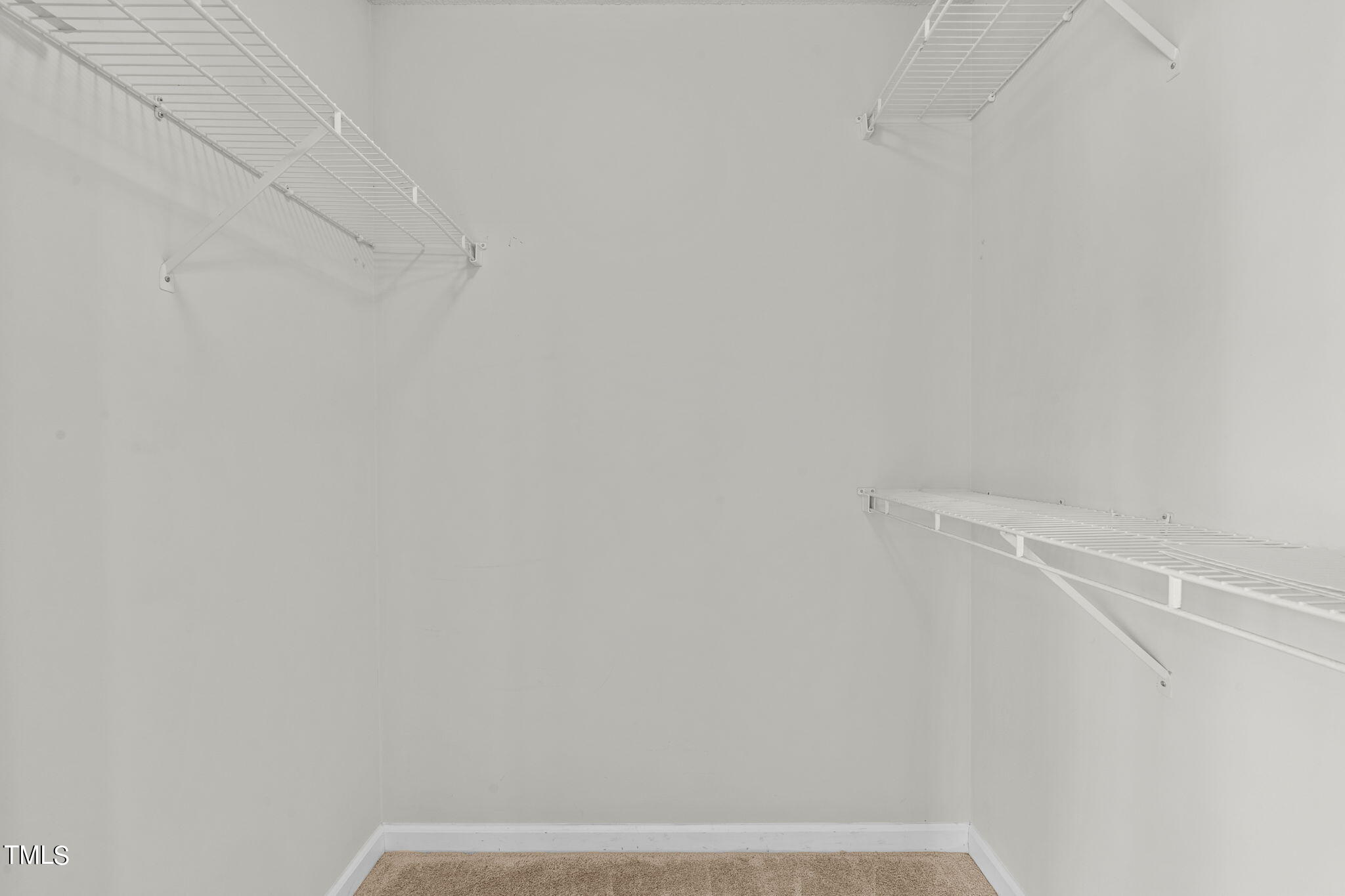 Undisclosed Address Garner, NC 27529 - Photo 17 of 31 a view of small space with racks on the wall