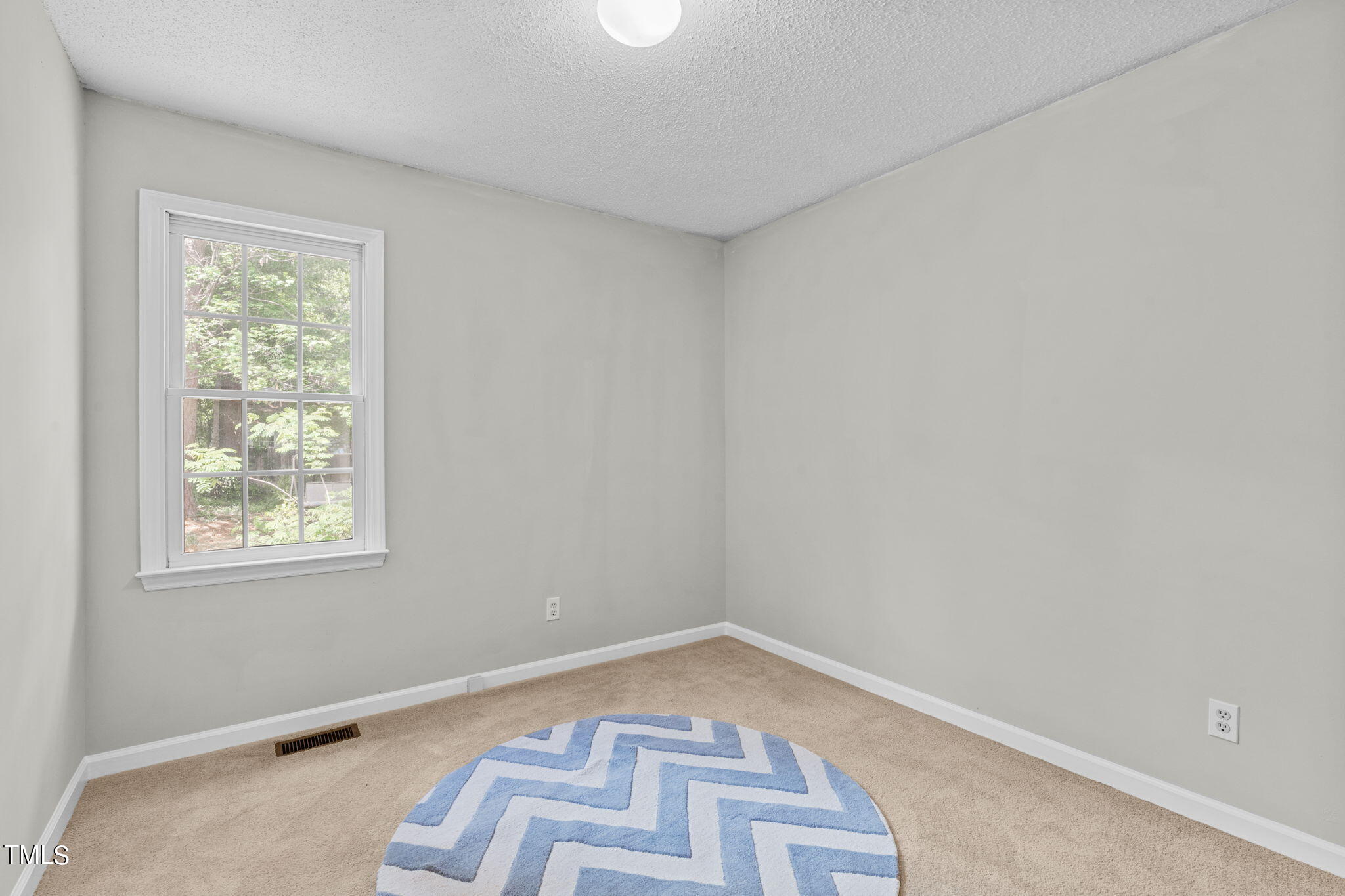 Undisclosed Address Garner, NC 27529 - Photo 24 of 31 an empty room with windows