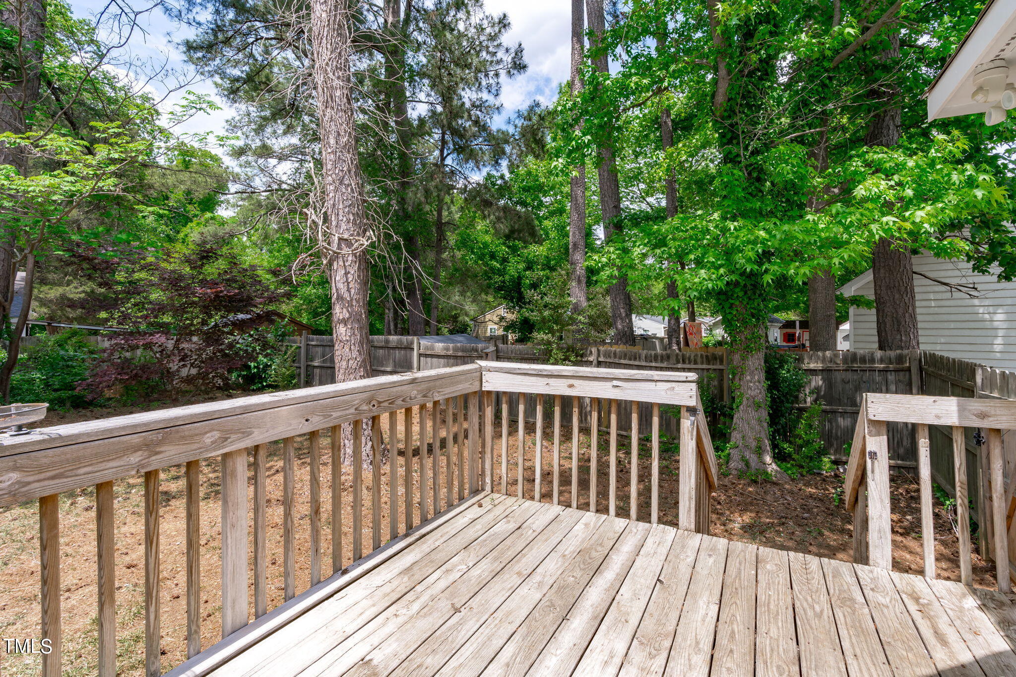 Undisclosed Address Garner, NC 27529 - Photo 26 of 31 a view of wooden deck and a yard with wooden fence