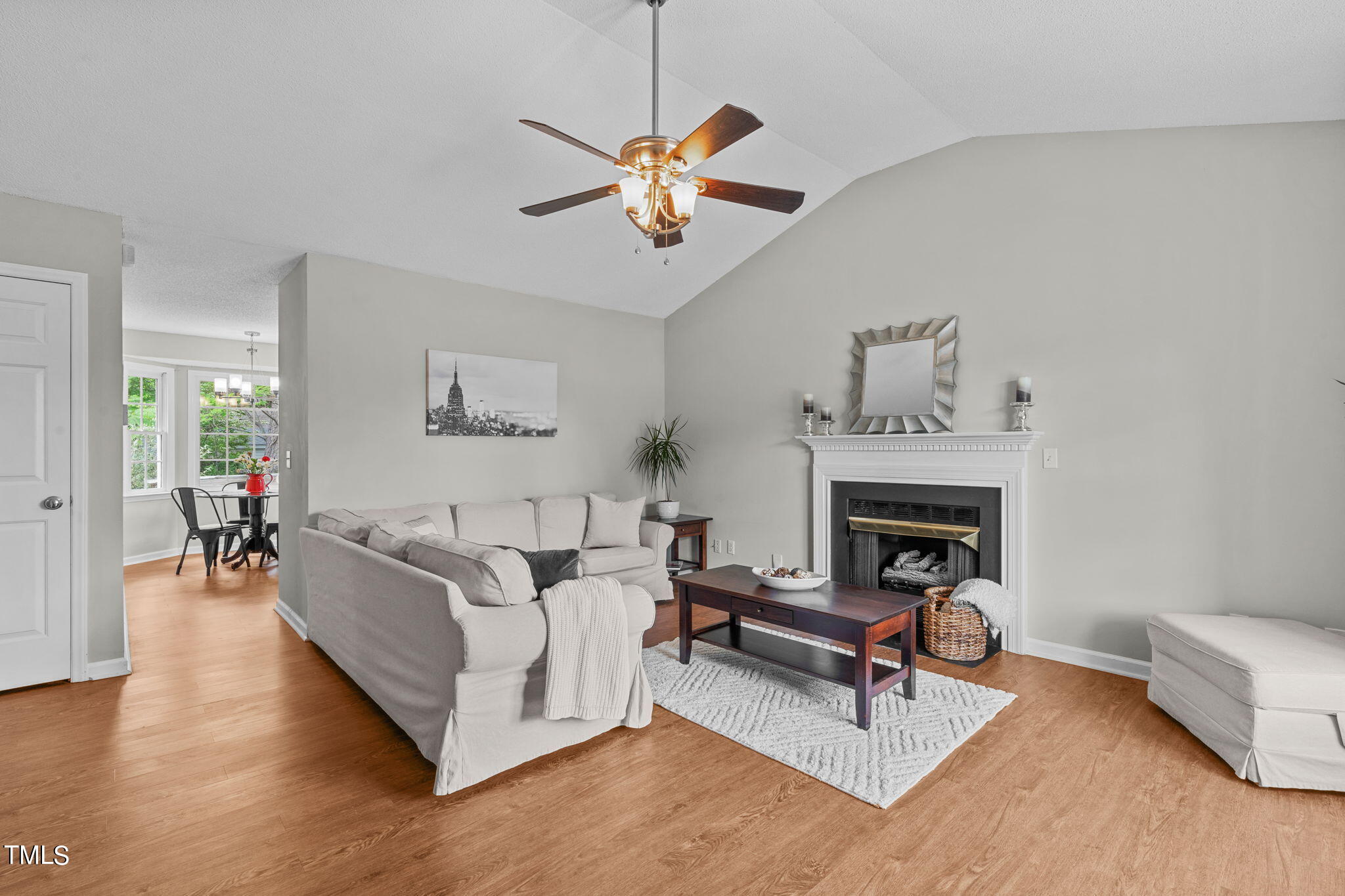 Undisclosed Address Garner, NC 27529 - Photo 6 of 31 a living room with furniture and a fireplace