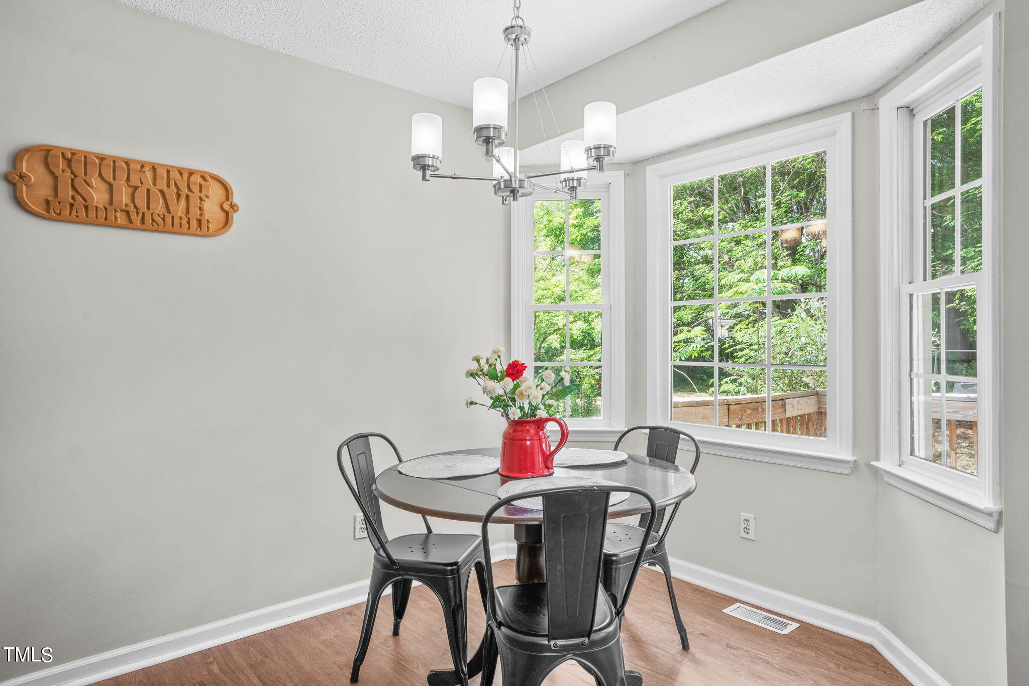 Undisclosed Address Garner, NC 27529 - Photo 10 of 31 a view of a dining room with furniture window and outside view