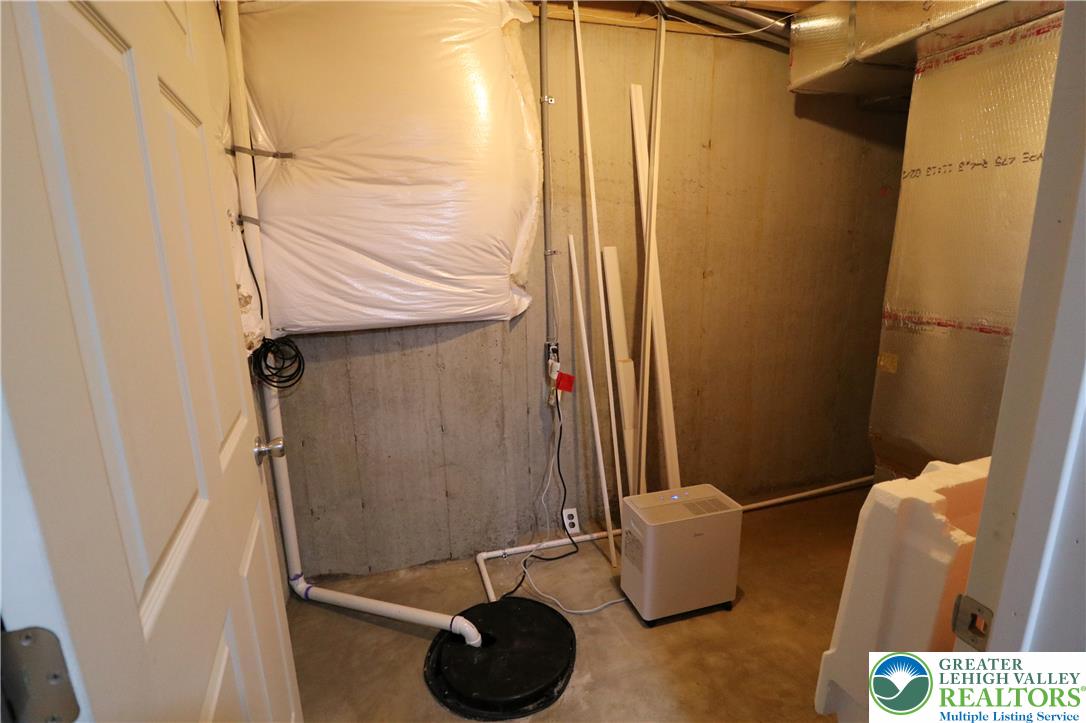 4502 Benjamin Court Emmaus, PA 18049 - Photo 45 of 53 Unfinished section with sump pump and furnace access.