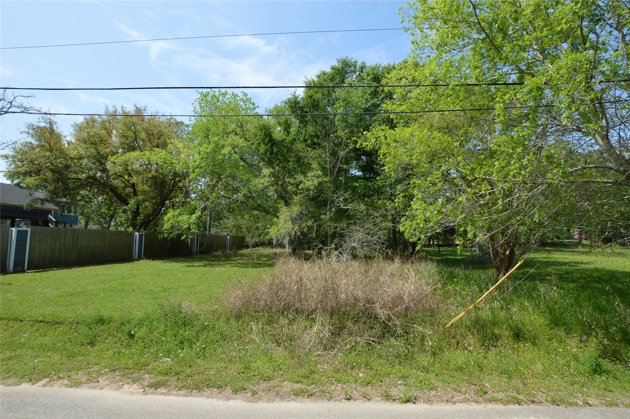 0 Bryant Lane Webster, TX 77598 - Photo 1 of 10 a backyard of a house with lots of green space