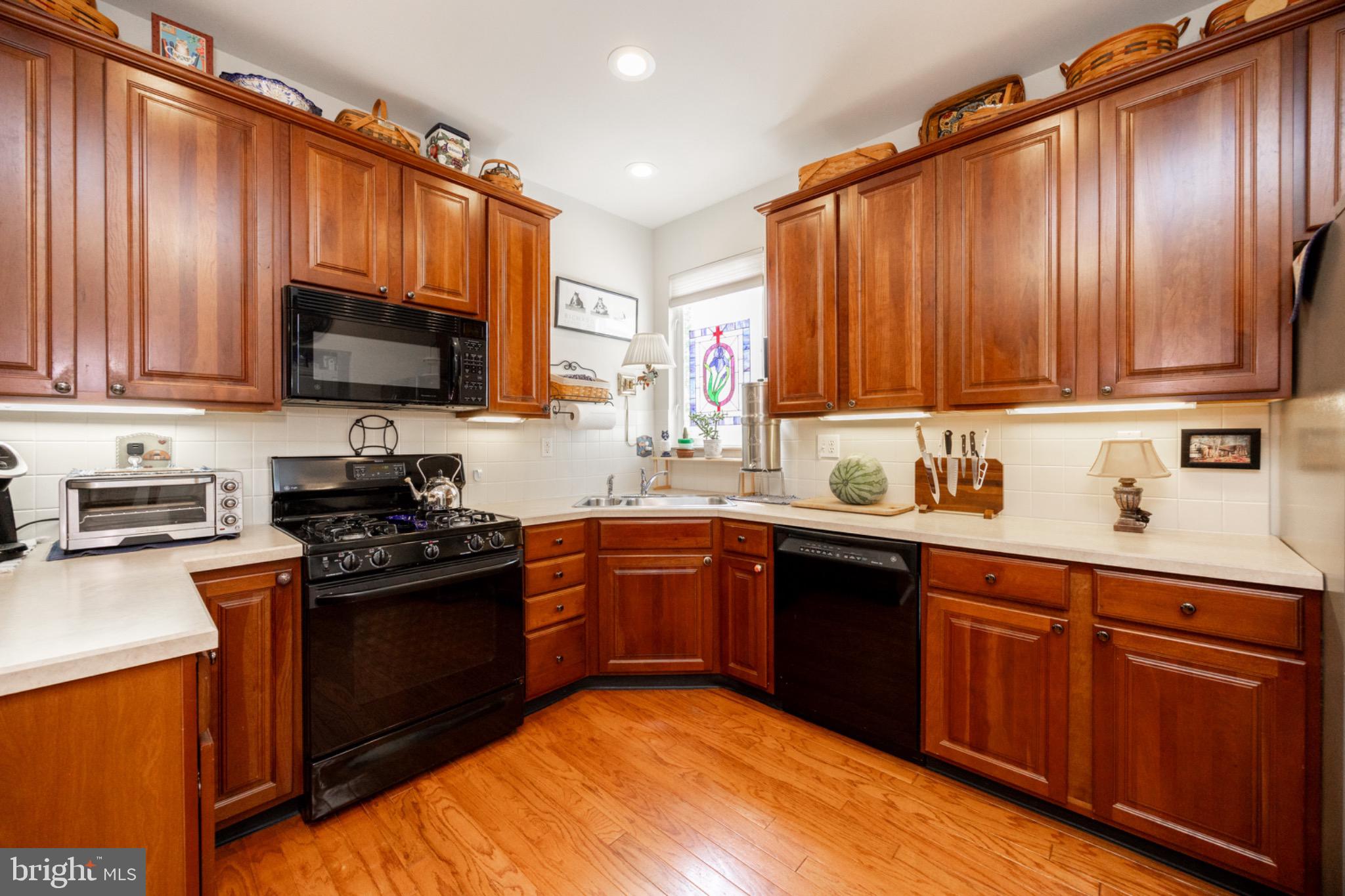 1701 Dawman Road Coatesville, PA 19320 - Photo 12 of 29 Warm wood tones in a cozy kitchen space.