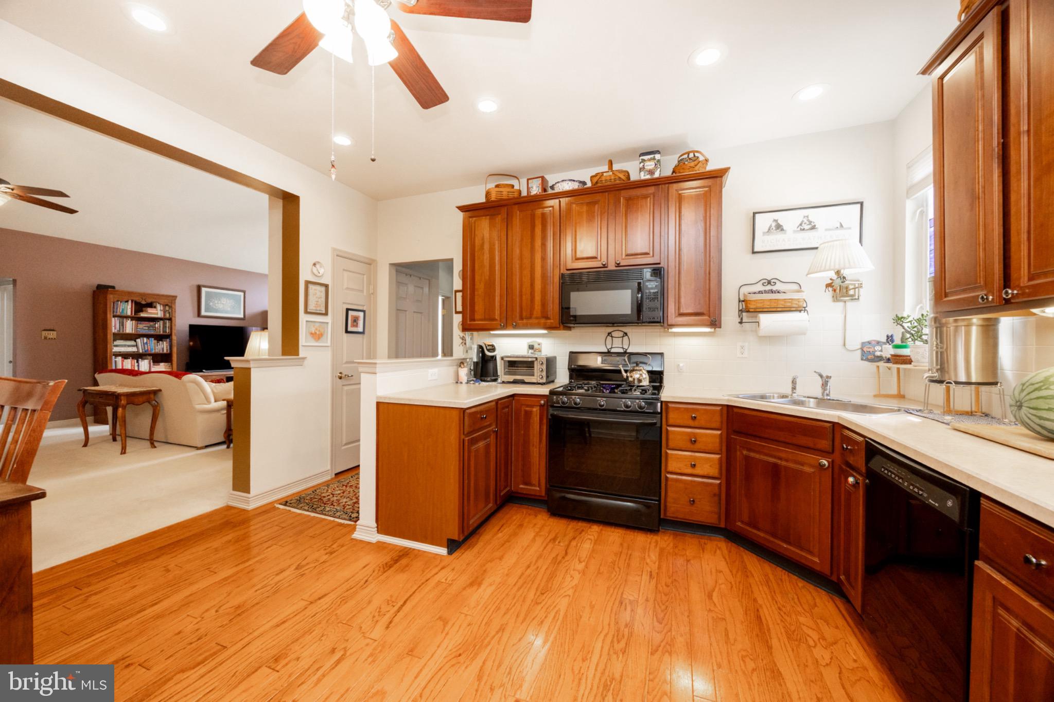 1701 Dawman Road Coatesville, PA 19320 - Photo 14 of 29 Warm and inviting kitchen with rich wood tones.