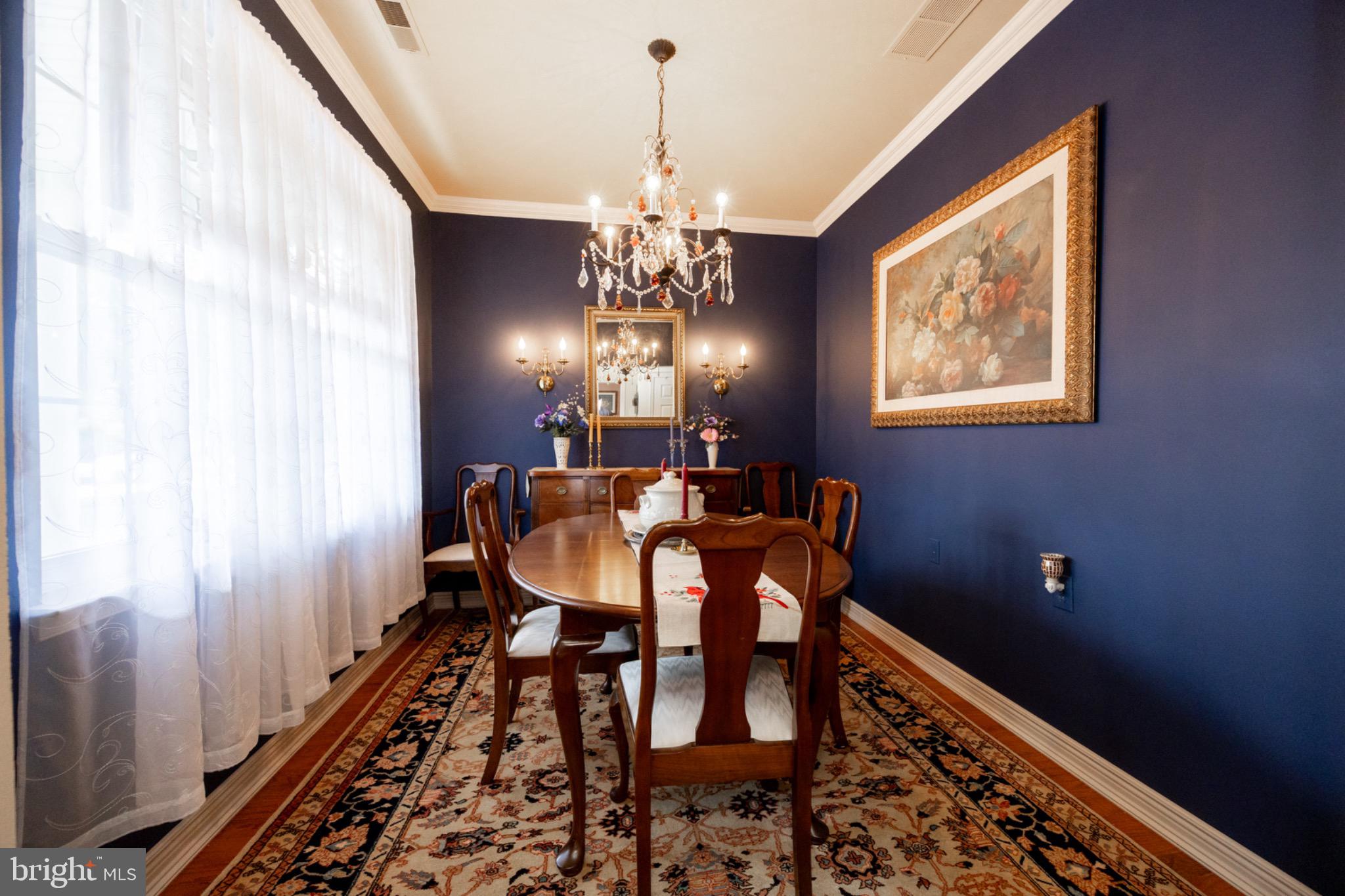 1701 Dawman Road Coatesville, PA 19320 - Photo 7 of 29 Elegant dining space with rich blue walls.