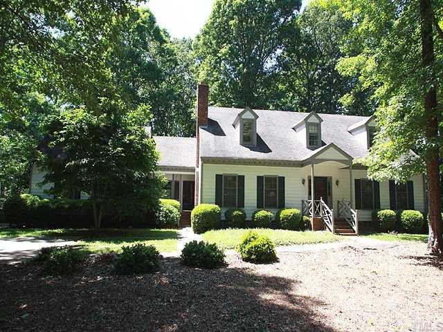 1432 Kildaire Farm Road Cary, NC 27511 - Photo 1 of 17 Lots of charm with this Williamsburgh-style exterior. Dual entrances for friends and family. Beautifully set back from the road with a spacious front yard. This home is withing walking distance of supermarkets and many other necessities.