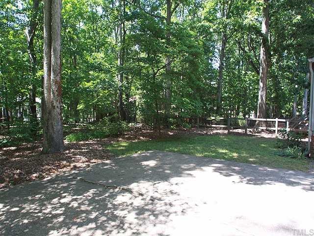 1432 Kildaire Farm Road Cary, NC 27511 - Photo 15 of 17 The parking pad at the entrance to the garage is also great for guest parking. Note the fenced area for that much loved pet.