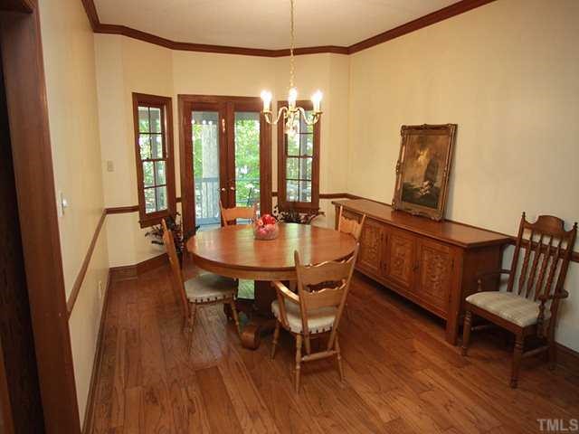 1432 Kildaire Farm Road Cary, NC 27511 - Photo 4 of 17 This is a wonderfully spacious room that could accomodate many guests at an extended table. Note the beautiful hardwood floors and double doors to the deck.