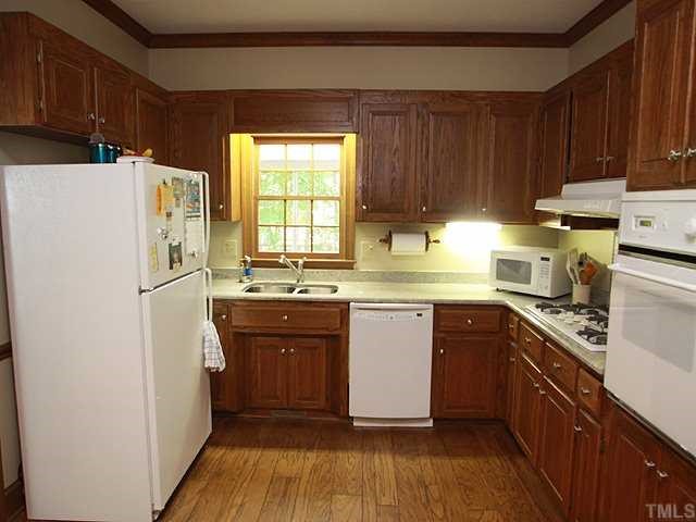 1432 Kildaire Farm Road Cary, NC 27511 - Photo 5 of 17 This is a very functional kitchen with lots of cabinets and all appliances including a gas stove.