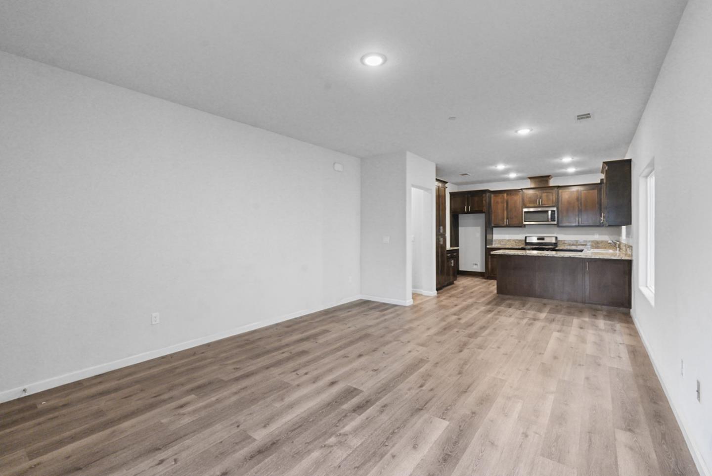 683 Granada Court Merced, CA 95341 - Photo 5 of 14 a view of kitchen with wooden floor