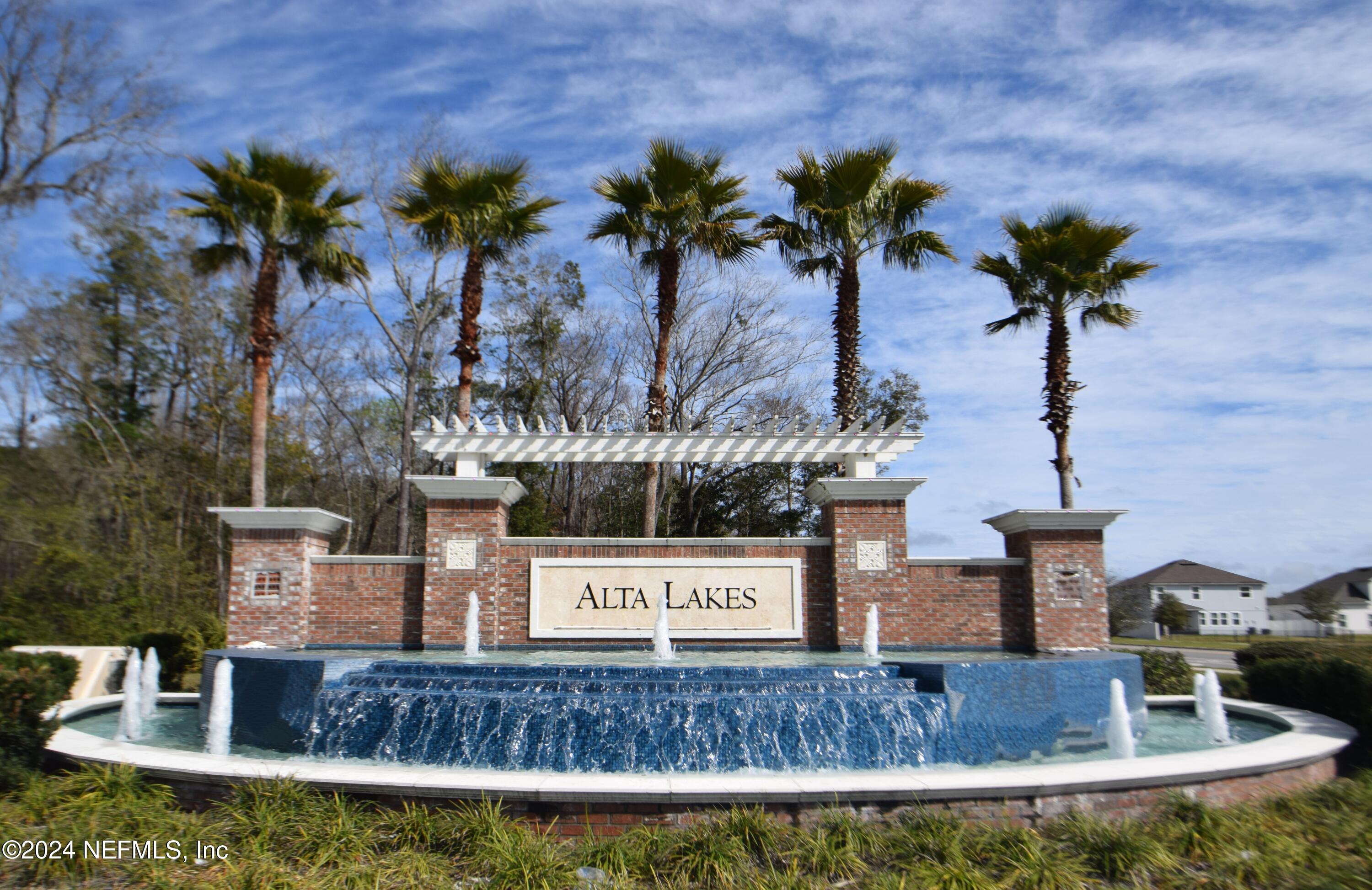 11291 Sheepshead Lane Jacksonville, FL 32226 - Photo 2 of 54 a vase of flowers sitting on a table