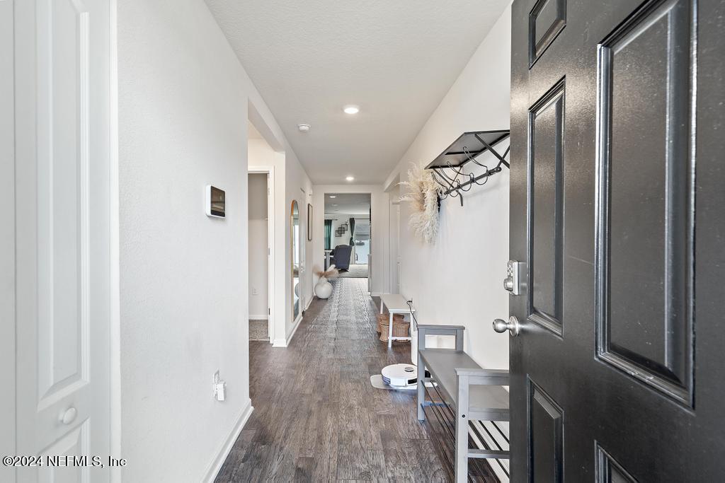 11291 Sheepshead Lane Jacksonville, FL 32226 - Photo 6 of 54 a view of a living room with furniture and wooden floor