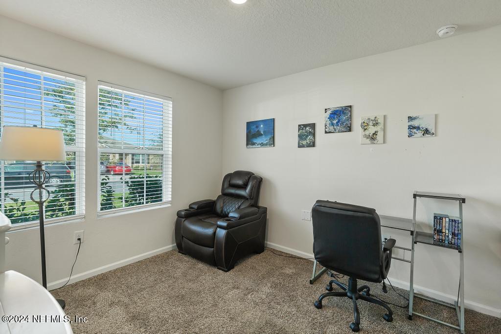 11291 Sheepshead Lane Jacksonville, FL 32226 - Photo 8 of 54 a workspace with furniture and a window