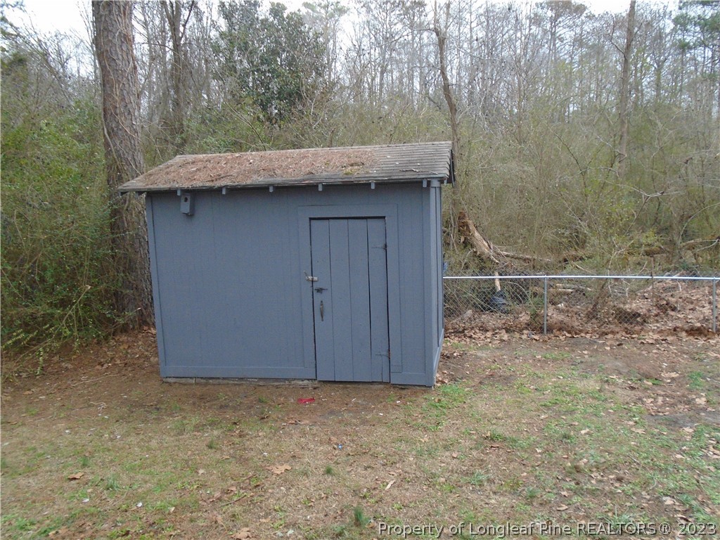 5858 Columbine Road Fayetteville, NC 28306 - Photo 6 of 10 a backyard of a house