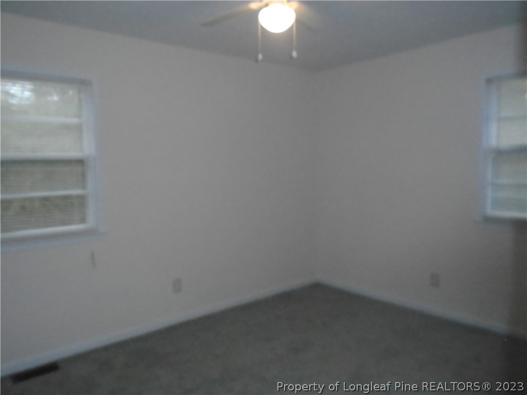 5858 Columbine Road Fayetteville, NC 28306 - Photo 9 of 10 a room that has a window