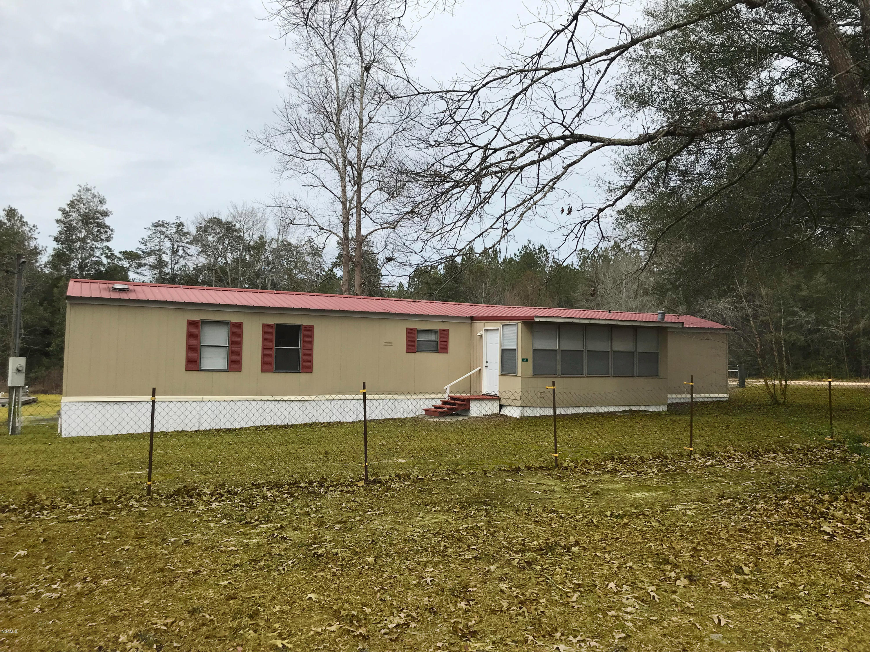 68 Ponderosa Road Wiggins, MS 39577 - Photo 1 of 17 Front