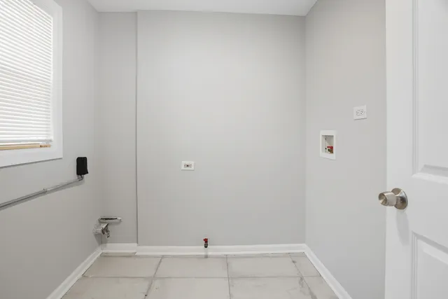 a view of a room with rack on the wall