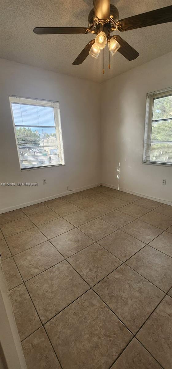 3670 Southwest 10th Street, Unit 10B Miami, FL 33135 - Photo 11 of 12 a view of an empty room with a window