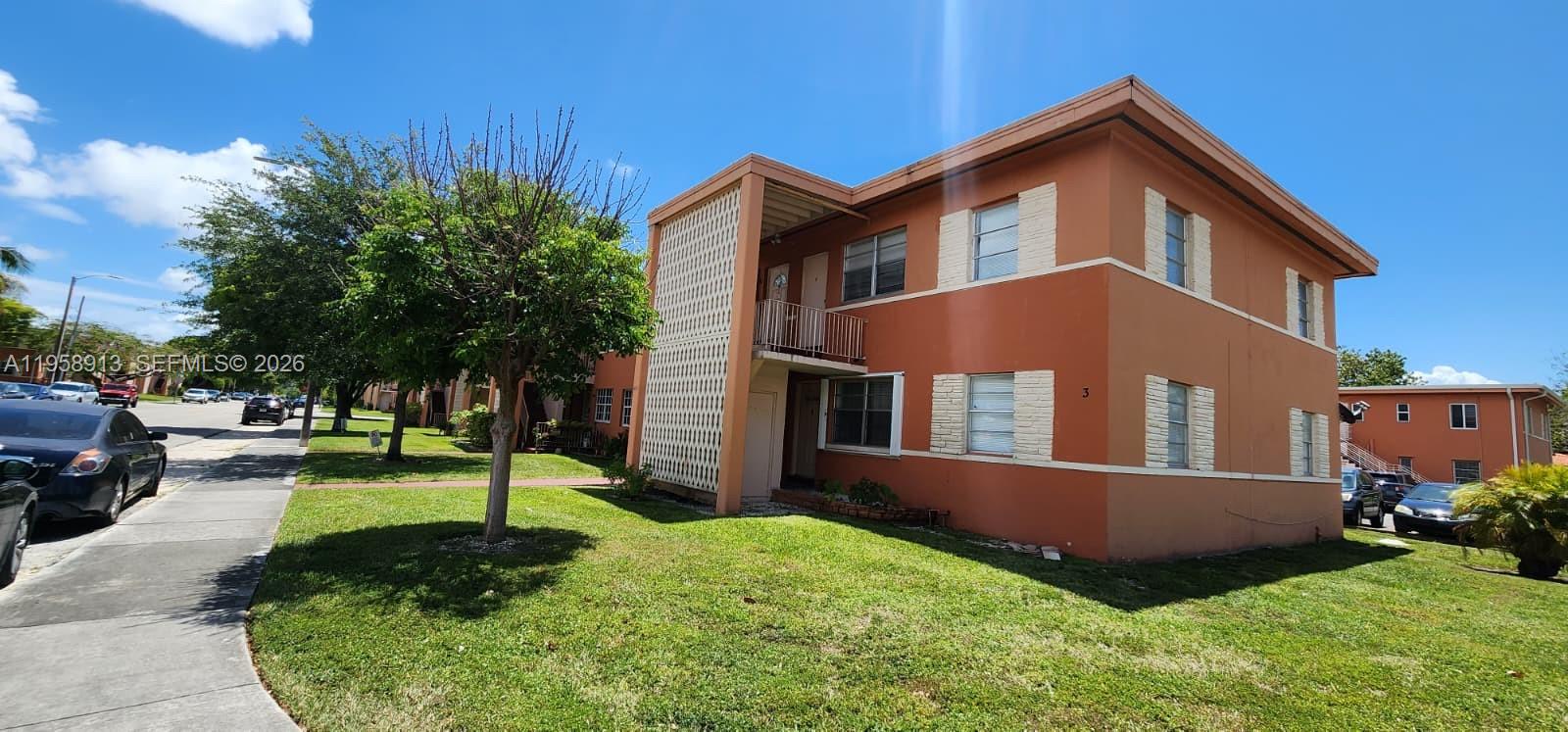3670 Southwest 10th Street, Unit 10B Miami, FL 33135 - Photo 11 of 14 a front view of a house with a yard