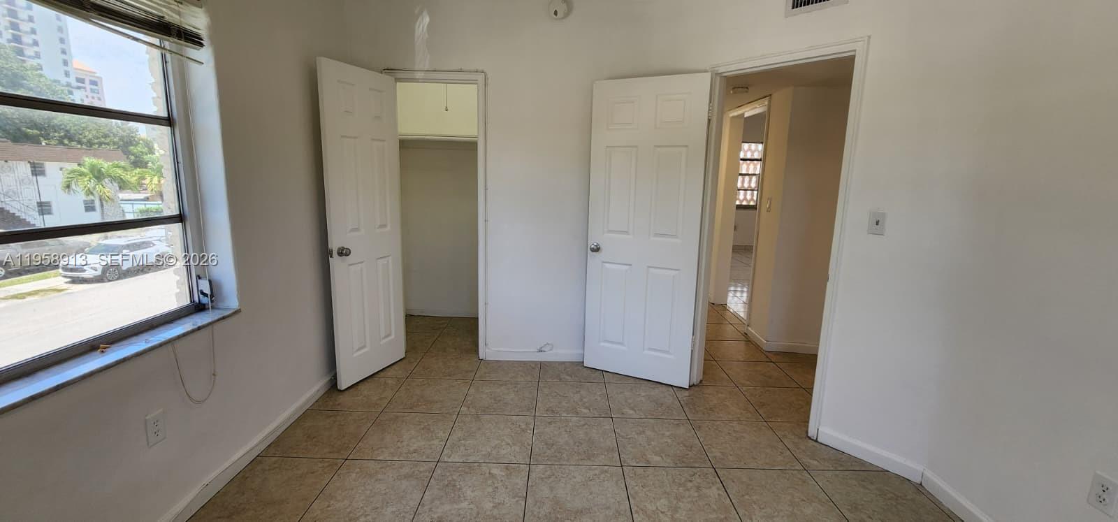 3670 Southwest 10th Street, Unit 10B Miami, FL 33135 - Photo 6 of 14 a view of entryway with bathroom